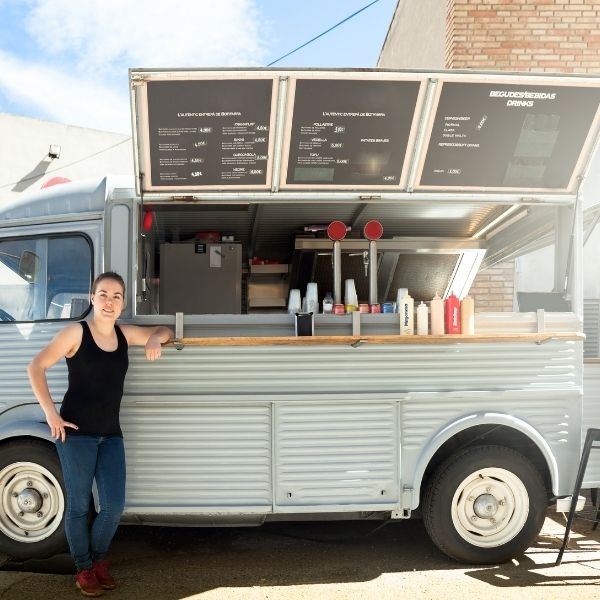 Food Truck Owner Standing outside her Truck